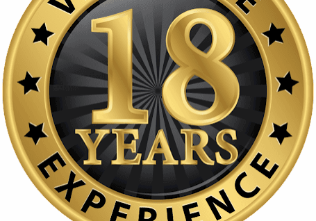 Gold badge celebrating 18 years experience