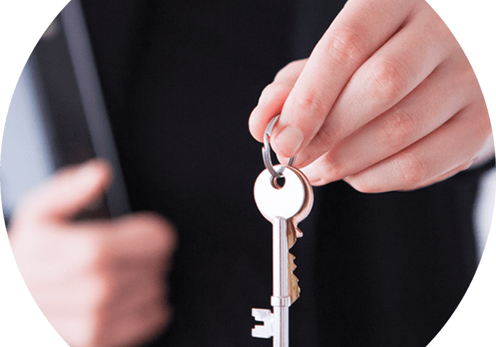 Person holding a house key